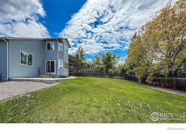 678 Mcclure Ct, Erie, CO 80516 - view of yard with a patio