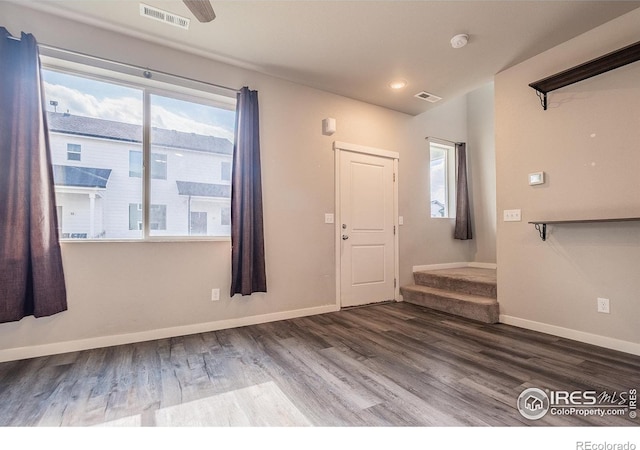 710 Oregon Trl Unit B1, Ault, CO 80610 - foyer entrance featuring wood finished floors, baseboards, stairway, and recessed lighting