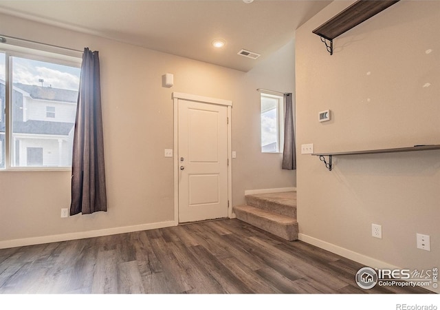 710 Oregon Trl Unit B1, Ault, CO 80610 - entryway with wood finished floors, stairs, and baseboards