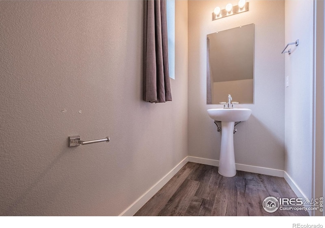 710 Oregon Trl Unit B1, Ault, CO 80610 - bathroom with wood finished floors and baseboards