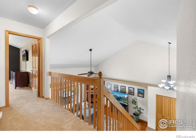 1502 Westfield Dr, Fort Collins, CO 80526 - hallway with vaulted ceiling, a chandelier, an upstairs landing, and baseboards