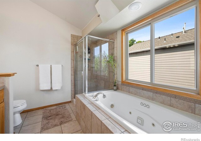1502 Westfield Dr, Fort Collins, CO 80526 - full bathroom with toilet, a tub with jets, a stall shower, baseboards, and tile patterned flooring