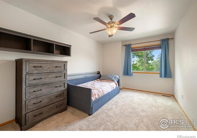 1502 Westfield Dr, Fort Collins, CO 80526 - bedroom with carpet floors, baseboards, and ceiling fan