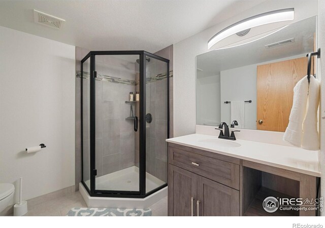 1502 Westfield Dr, Fort Collins, CO 80526 - full bath featuring toilet, a shower stall, and vanity
