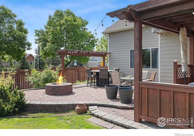 1502 Westfield Dr, Fort Collins, CO 80526 - view of patio featuring an outdoor fire pit, a pergola, and outdoor dining space
