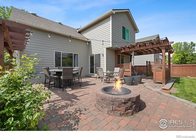 1502 Westfield Dr, Fort Collins, CO 80526 - view of patio with a fire pit, a pergola, and outdoor dining space