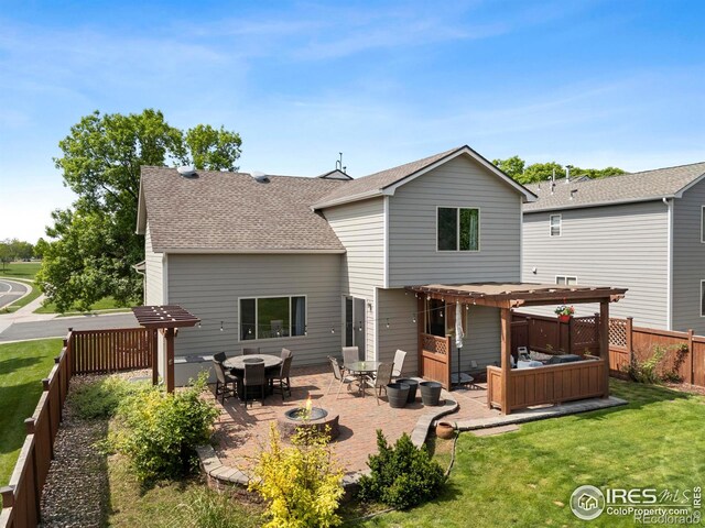 1502 Westfield Dr, Fort Collins, CO 80526 - rear view of house with a pergola, a patio, an outdoor fire pit, and roof with shingles