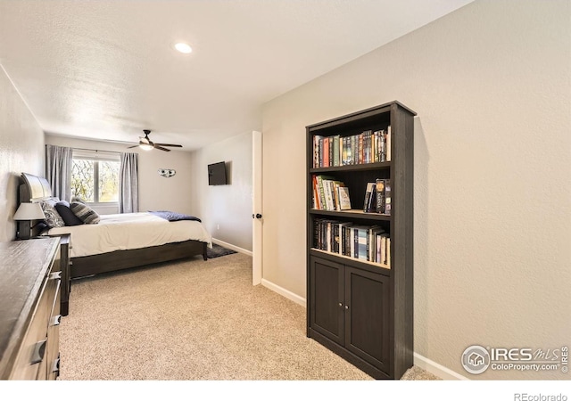 2447 E 100th Way, Thornton, CO 80229 - carpeted bedroom featuring baseboards and a ceiling fan