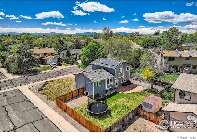 2447 E 100th Way, Thornton, CO 80229 - aerial view of residential area featuring a mountain backdrop