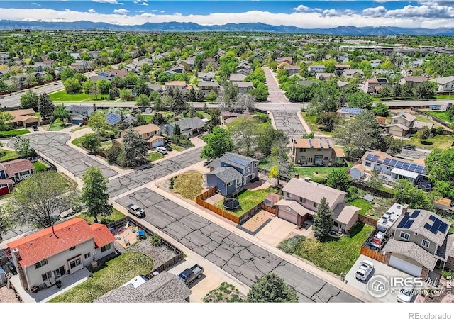 2447 E 100th Way, Thornton, CO 80229 - aerial perspective of suburban area with mountains