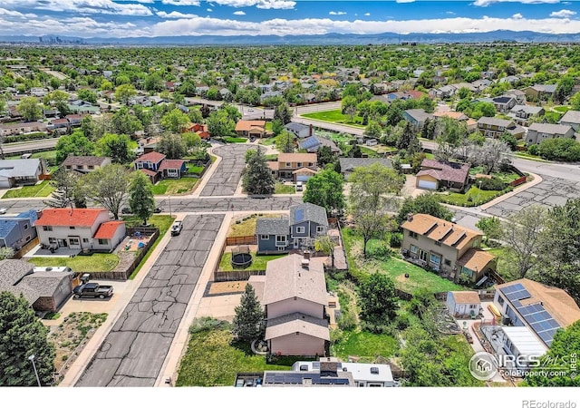 2447 E 100th Way, Thornton, CO 80229 - aerial view of residential area featuring a mountainous background