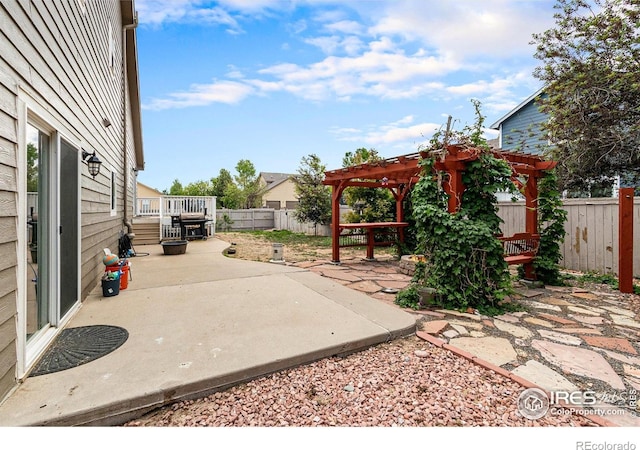 3328 Wild W Ln, Wellington, CO 80549 - fenced backyard with a patio area and a pergola