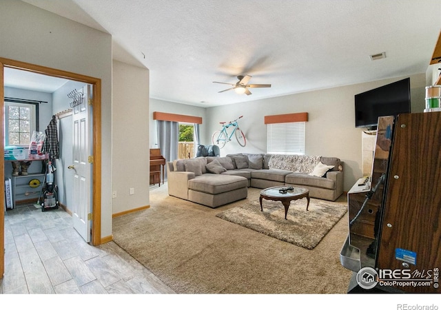 3328 Wild W Ln, Wellington, CO 80549 - living area with a ceiling fan and wood finished floors