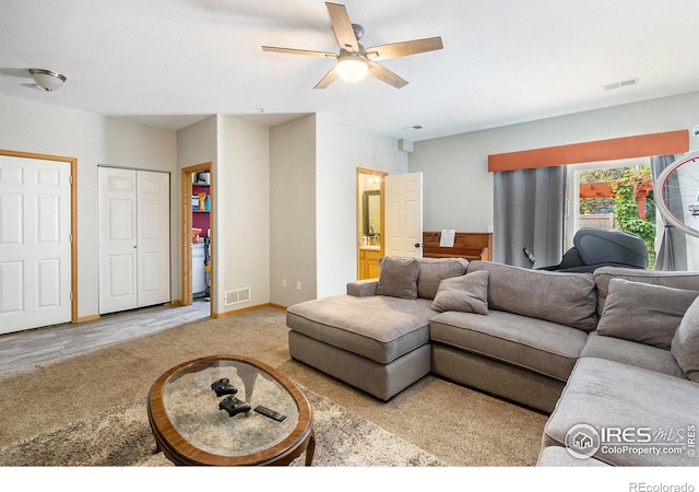 3328 Wild W Ln, Wellington, CO 80549 - carpeted living area with a ceiling fan and baseboards