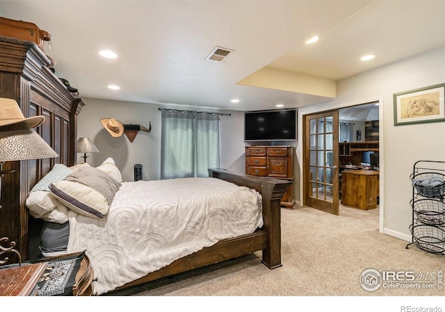 3328 Wild W Ln, Wellington, CO 80549 - bedroom with light carpet, recessed lighting, and french doors