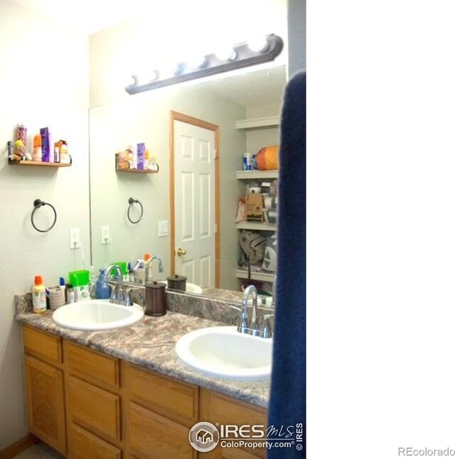 3328 Wild W Ln, Wellington, CO 80549 - full bath featuring double vanity