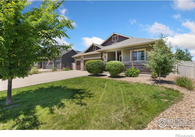 5869 Vinca Ave, Longmont, CO 80504 - craftsman house with a garage, covered porch, and concrete driveway