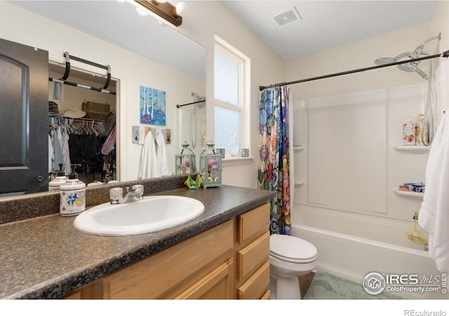 5869 Vinca Ave, Longmont, CO 80504 - full bath with vanity, shower / tub combo, toilet, and a walk in closet