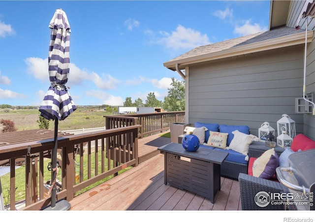 5869 Vinca Ave, Longmont, CO 80504 - wooden terrace with an outdoor living space