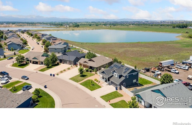 5869 Vinca Ave, Longmont, CO 80504 - aerial perspective of suburban area with a large body of water