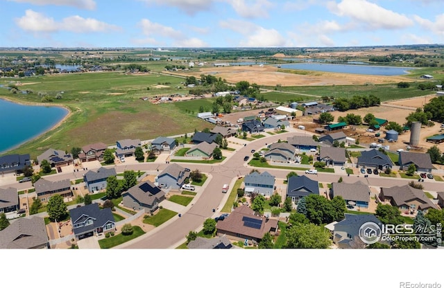 5869 Vinca Ave, Longmont, CO 80504 - aerial perspective of suburban area with a nearby body of water