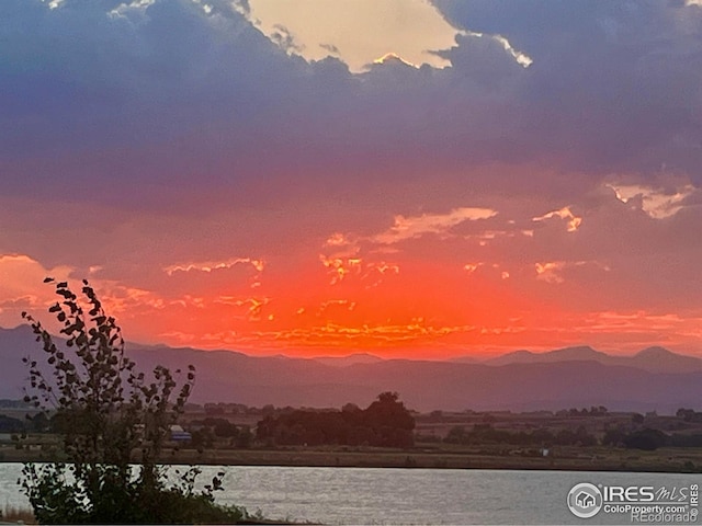 5869 Vinca Ave, Longmont, CO 80504 - mountain view featuring a nearby body of water