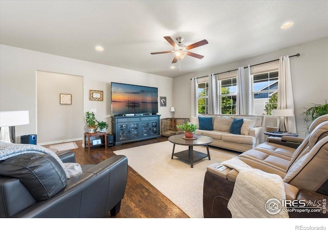 2150 Crop Row Dr, Windsor, CO 80550 - living room featuring wood finished floors, a ceiling fan, and recessed lighting