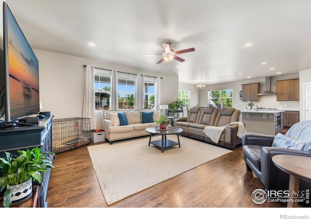 2150 Crop Row Dr, Windsor, CO 80550 - living area with a ceiling fan, dark wood-style floors, and recessed lighting