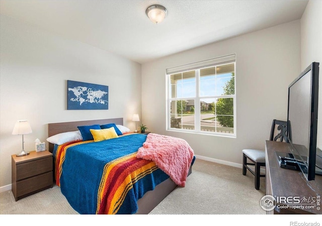 2150 Crop Row Dr, Windsor, CO 80550 - carpeted bedroom featuring baseboards