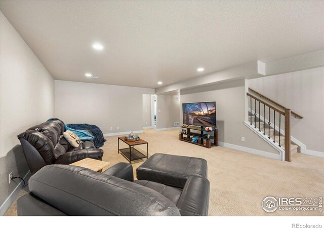2150 Crop Row Dr, Windsor, CO 80550 - living room with carpet floors, recessed lighting, baseboards, and stairs