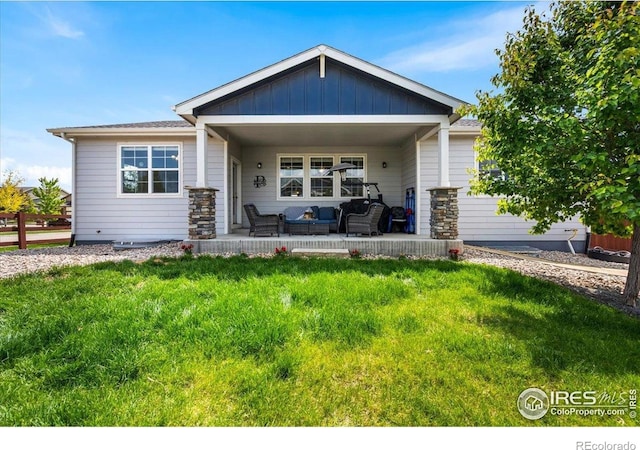 2150 Crop Row Dr, Windsor, CO 80550 - view of front of house with an outdoor living space and a front yard