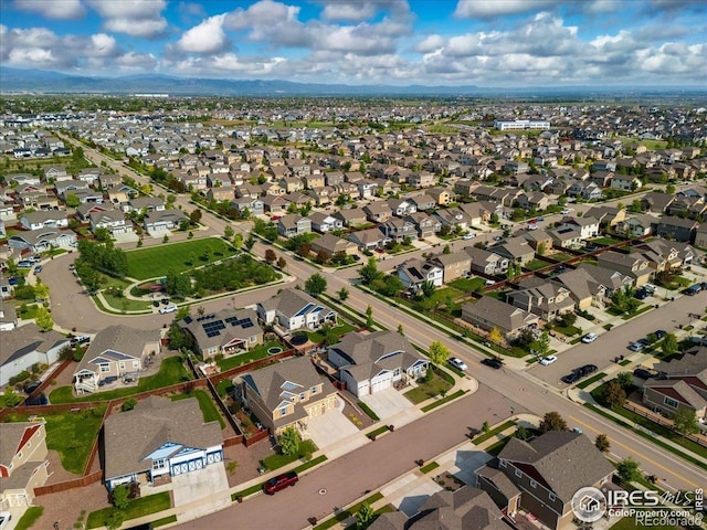 2150 Crop Row Dr, Windsor, CO 80550 - aerial view of property's location featuring nearby suburban area and a mountainous background