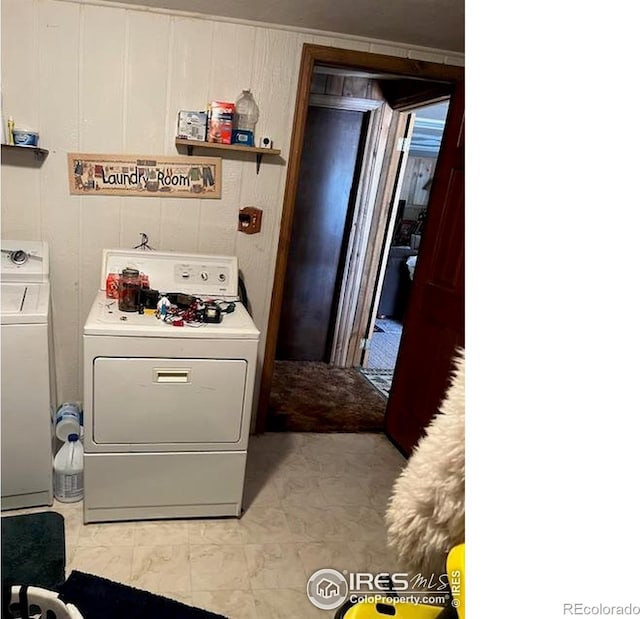 100 Santee Ct, Red Feather Lakes, CO 80545 - laundry room with washing machine and dryer