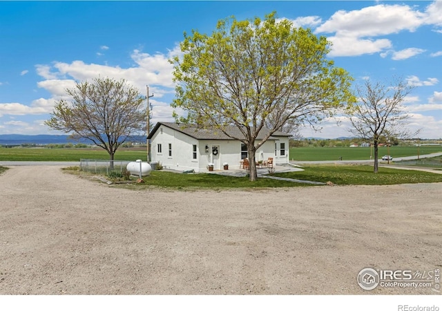 19810 County Road 1, Berthoud, CO 80513 - view of home's exterior with a lawn