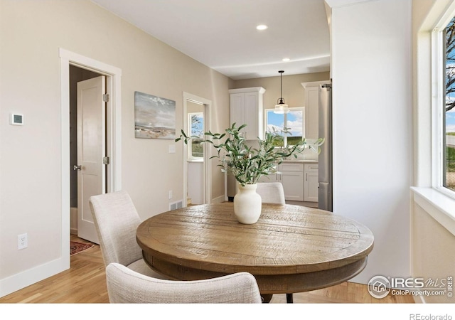 19810 County Road 1, Berthoud, CO 80513 - dining space with light wood finished floors, recessed lighting, and baseboards