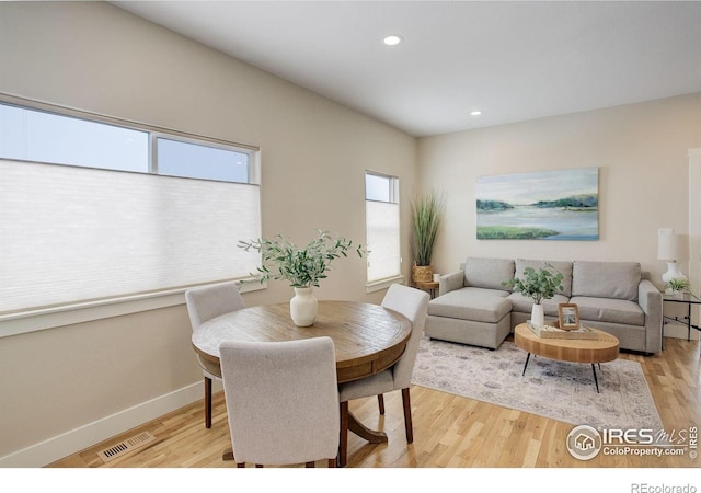 19810 County Road 1, Berthoud, CO 80513 - dining area featuring wood finished floors, baseboards, and recessed lighting