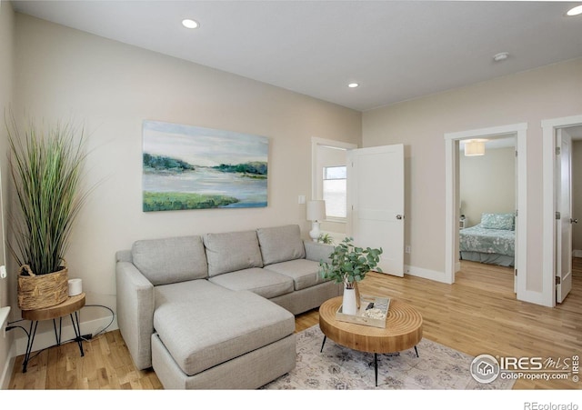 19810 County Road 1, Berthoud, CO 80513 - living room with light wood-style floors, recessed lighting, and baseboards