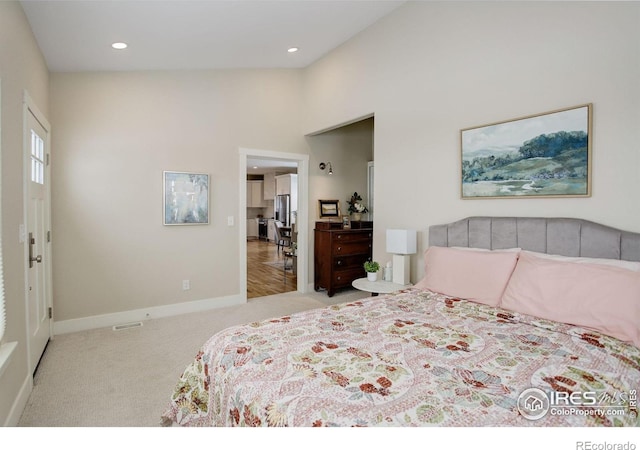 19810 County Road 1, Berthoud, CO 80513 - carpeted bedroom featuring baseboards, recessed lighting, and a towering ceiling