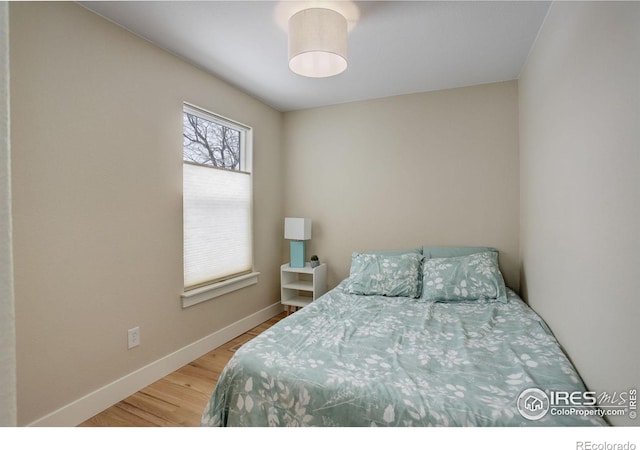 19810 County Road 1, Berthoud, CO 80513 - bedroom with wood finished floors and baseboards