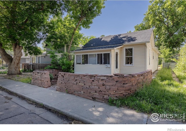 29 Marshall Pl, Longmont, CO 80504 - view of front of house featuring roof with shingles
