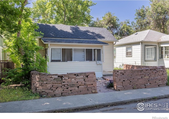 29 Marshall Pl, Longmont, CO 80504 - view of front of home featuring roof with shingles