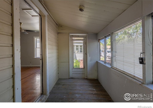 29 Marshall Pl, Longmont, CO 80504 - unfurnished sunroom featuring vaulted ceiling