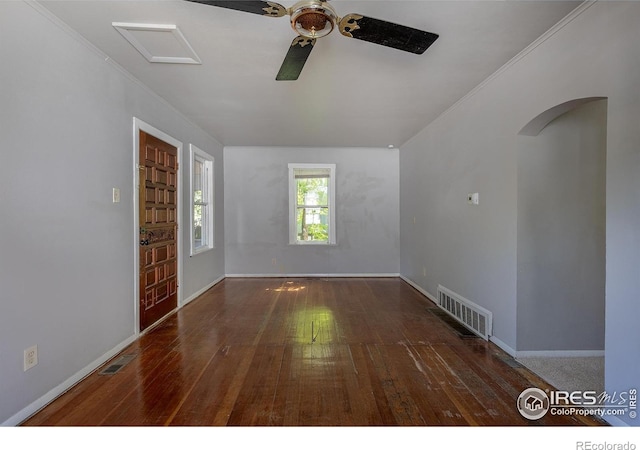 29 Marshall Pl, Longmont, CO 80504 - empty room featuring ceiling fan, hardwood / wood-style floors, arched walkways, and baseboards