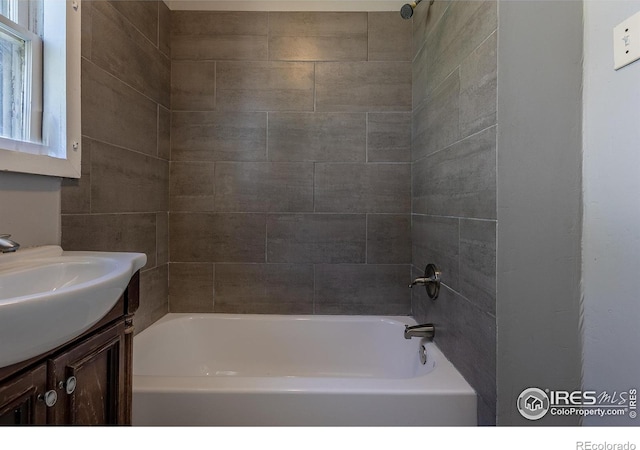 29 Marshall Pl, Longmont, CO 80504 - bathroom featuring vanity and shower / bathtub combination