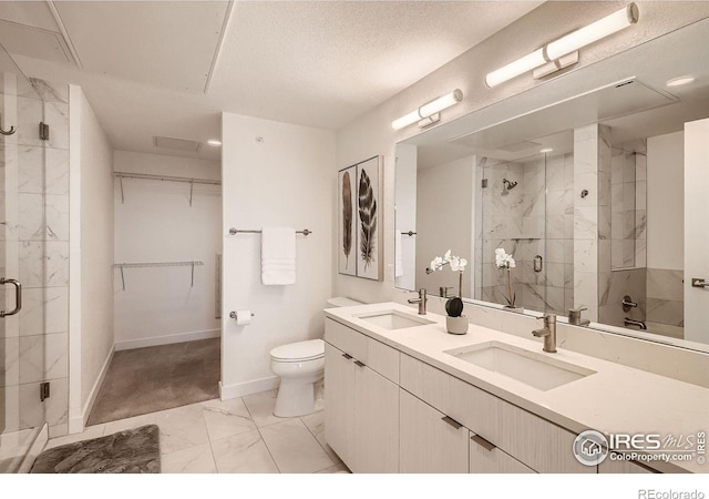 1616 S Broadway Unit 304, Denver, CO 80210 - bathroom with marble look tile flooring, a stall shower, toilet, double vanity, and baseboards