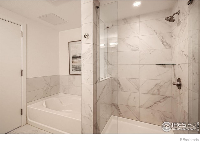1616 S Broadway Unit 304, Denver, CO 80210 - bathroom with a bath, a shower stall, recessed lighting, and marble finish flooring