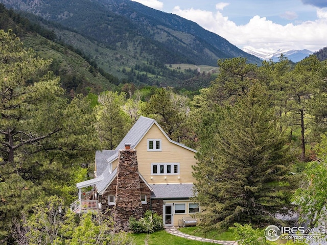 1031 W US Highway 34, Loveland, CO 80537 - view of mountain backdrop with a heavily wooded area