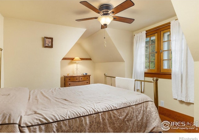 1031 W US Highway 34, Loveland, CO 80537 - bedroom with baseboards, wood finished floors, ceiling fan, and lofted ceiling