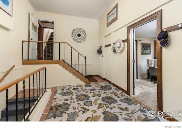 1031 W US Highway 34, Loveland, CO 80537 - foyer with stairway, carpet floors, and baseboards
