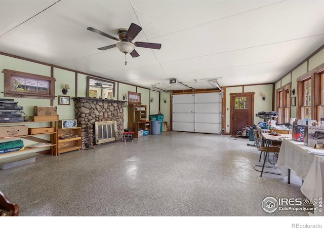 1031 W US Highway 34, Loveland, CO 80537 - garage with a ceiling fan and a garage door opener